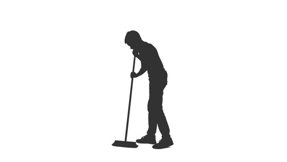 Silhouette of Teen Boy Sweeps Floor With Mop alt