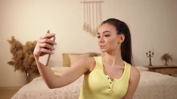 A Young Sports Girl Makes Selfies