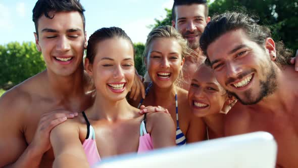 Group of friends taking selfie from mobile phone