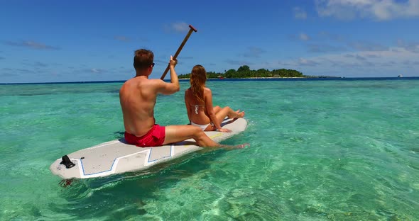 Fun people married on vacation enjoy luxury on beach on clean white sand background 4K