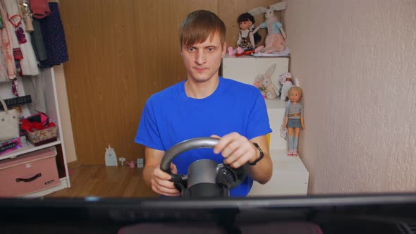 Man Playing Computer Races