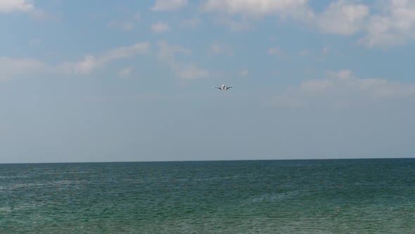 Airplane Over the Ocean