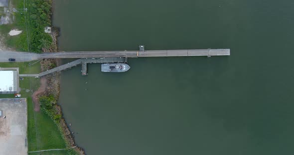 Birdseye view of small boat docked at port