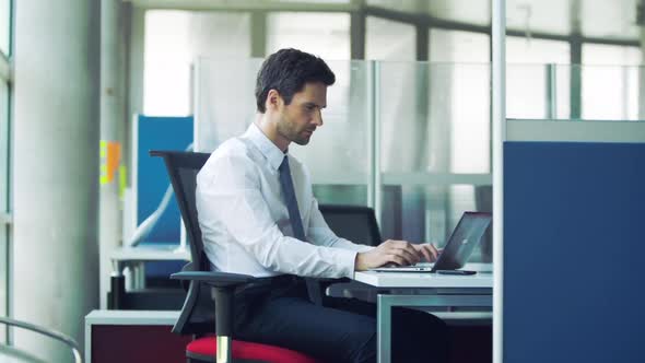 Businessman finishing assignment before deadline