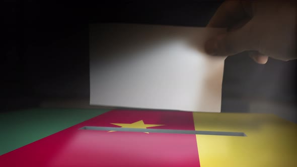 Digital Composite Hand Voting To National Flag OF Cameroon