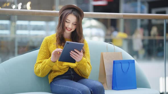Woman Shopping Online and Making Orders
