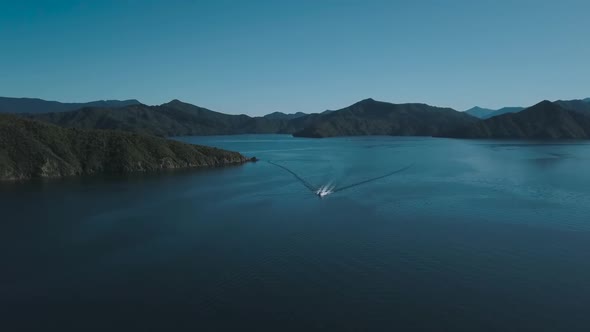 Aerial drone footage of a speed boat in Picton, New Zealand.