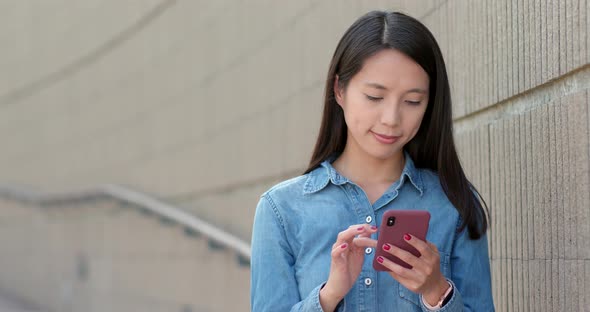 Young woman use of mobile phone