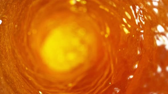 Super Slow Motion Shot of Ice Tea Vortex 