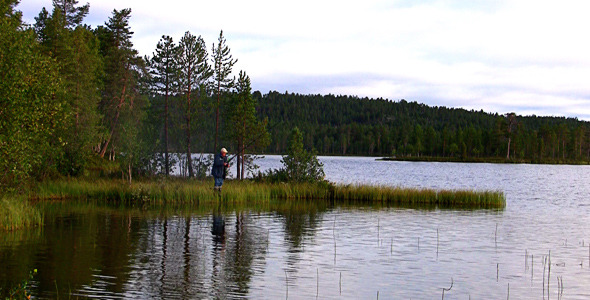 Fishermen Fishing On Lake 