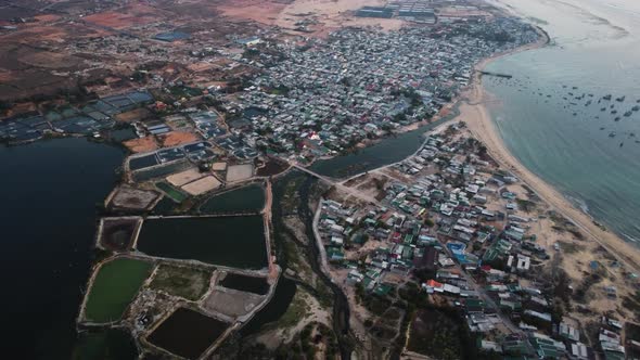 Aerial shot of famous Son hai town in southern vietnam with popular shrimp farming pools - Rotating
