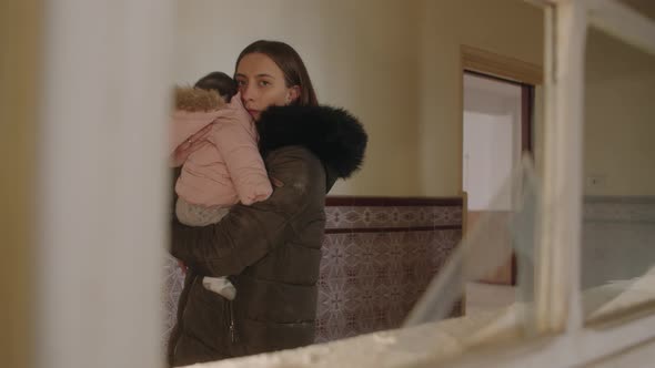Distressed single mom worrying about safety of her child during Ukraine war
