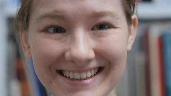 Smiling Young Female Face, Indoor