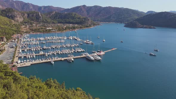 Yachts Docked on Pier in Yacht Club in Marine Bay