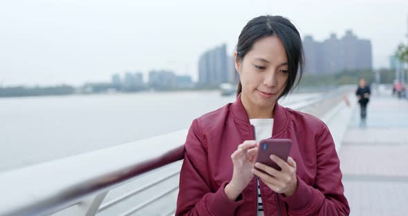 Woman use of smart phone at outdoor