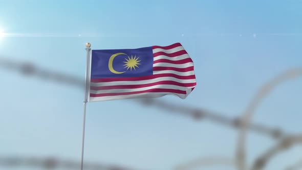 Malaysia Flag Behind Border