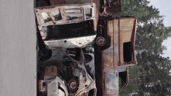 Vertical Video Irpin Ukraine  Burnt and Destroyed Cars