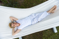 young woman resting on hammock - PhotoDune Item for Sale