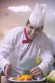 chef serving vegetable salad - PhotoDune Item for Sale