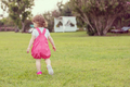 little girl spending time at backyard - PhotoDune Item for Sale