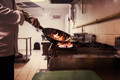 Chef doing flambe on food - PhotoDune Item for Sale