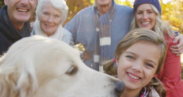 family with dog outdoors