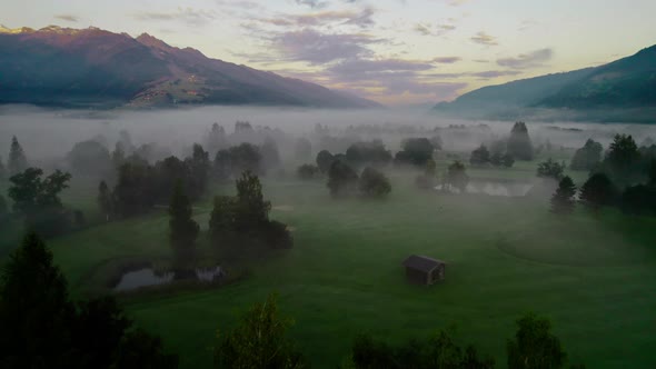 Drone Over Misty Landscape Of Zell Am See At Dawn