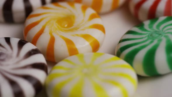 Rotating shot of a colorful mix of various hard candies - CANDY MIXED 
