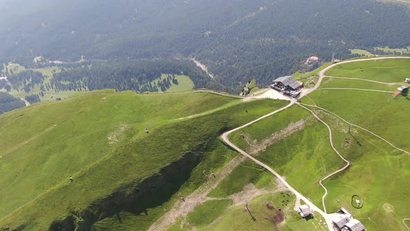 Drone approaching Seceda ridgeline - the highlight of the Puez Odle Nature Park