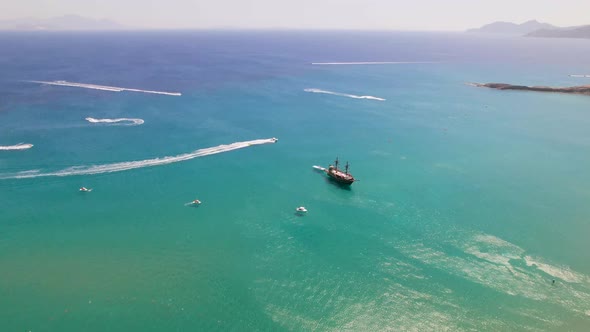 Aerial view of speed boats at Paradise Beach, Kos, Greece