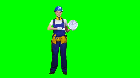 Brigadier Girl Is Holding a Large Clock and Showing Okay, Green Screen