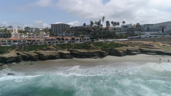 Aerial view of buildings along the coast alt