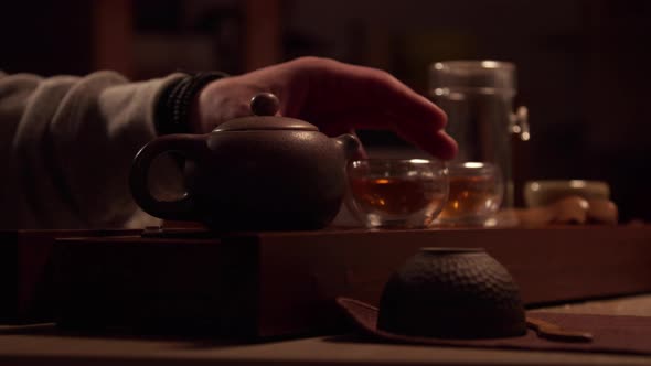 In an Intimate Atmosphere, a Man and a Woman Learn the Secrets of the Japanese Tea Ceremony. They