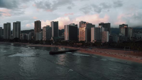 Aerial drone footage of Honolulu, Hawaii. Beautiful real estate, buildings in the city. Palm trees