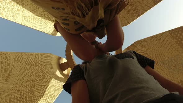 Couple kissing at the Russian-Egyptian Friendship Monument.