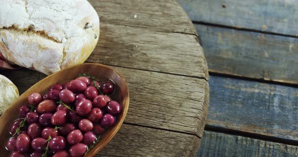 Olive tapas and pieces of bread