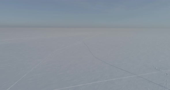 Aerial View of Cold Winter Landscape Arctic Field Trees Covered with Frost Snow Ice River and Sun