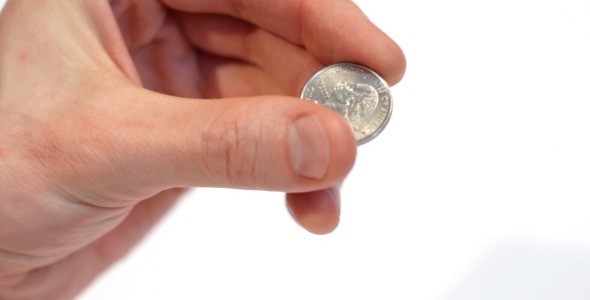 Male Hand Holding Quarter Dollar