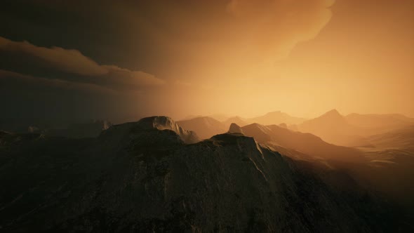 High Mountain Peaks Covered with Dramatic Heavy Fog