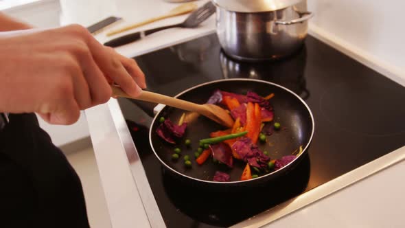 Man preparing a food in kitchen