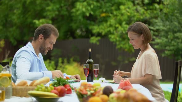Family Eating Vegetarian Food at Table, Vitaminized Nutrition, Healthy Lifestyle