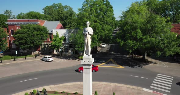 Confederate soldier statue in downtown Franklin, Tennessee with drone video pulling out.