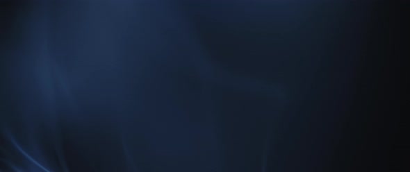 Blue incense smoke swirling on black background alt