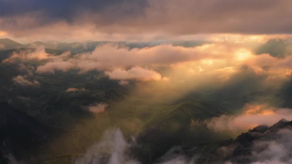 Low Clouds Over a Highland Plateau in the Rays of Sunset