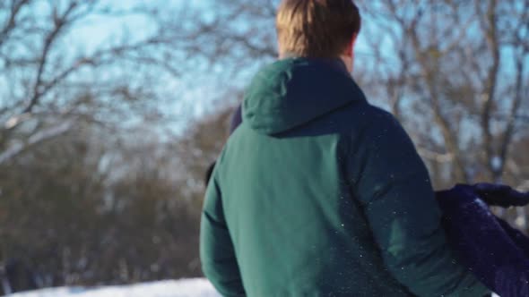 Happy Couple Having Fun in Winter Forest