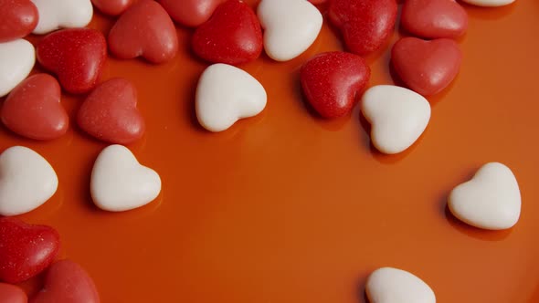 Rotating stock footage shot of Valentines decorations and candies - VALENTINES 0052