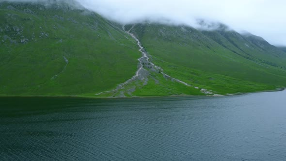 Glen Etive drone shot of mountainous backdrop in clouds