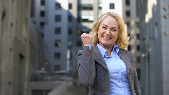 Happy Female Boss Showing Success Gesture, Work Achievement, Business Goals