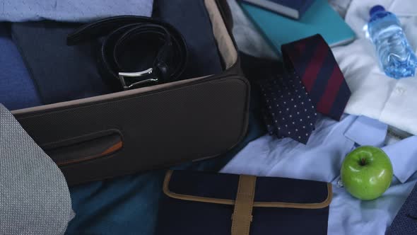 Business Travel Background: Businessman's Suitcase Ready for Business Trip