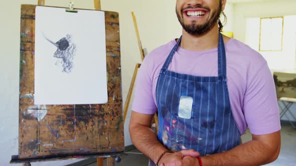 Happy man standing in drawing class 4k